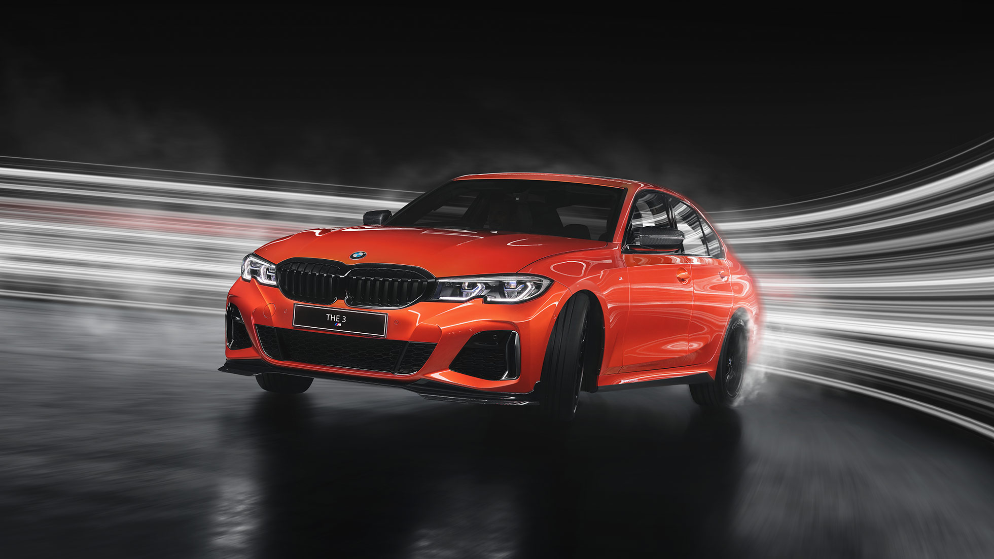 BMW M340i xDrive BMW M340i xDrive Sedan G20 Sapphire Black metallic side view while driving
